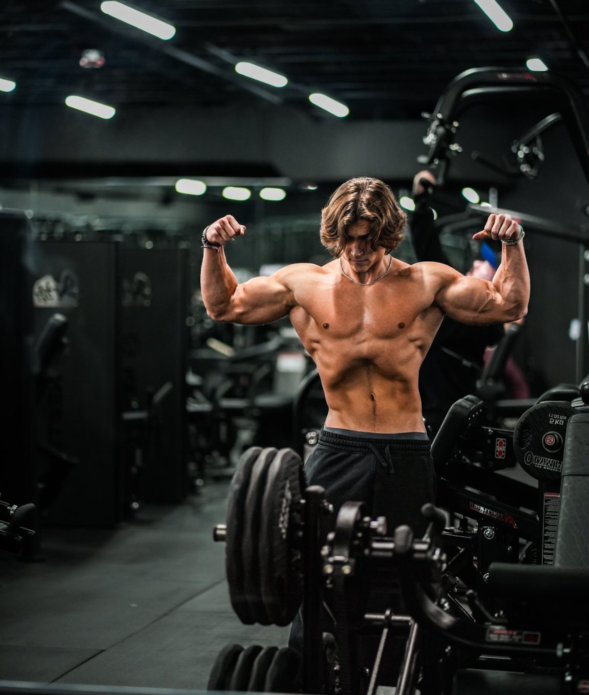 Ryan Shaw — double biceps flex in the gym mirror